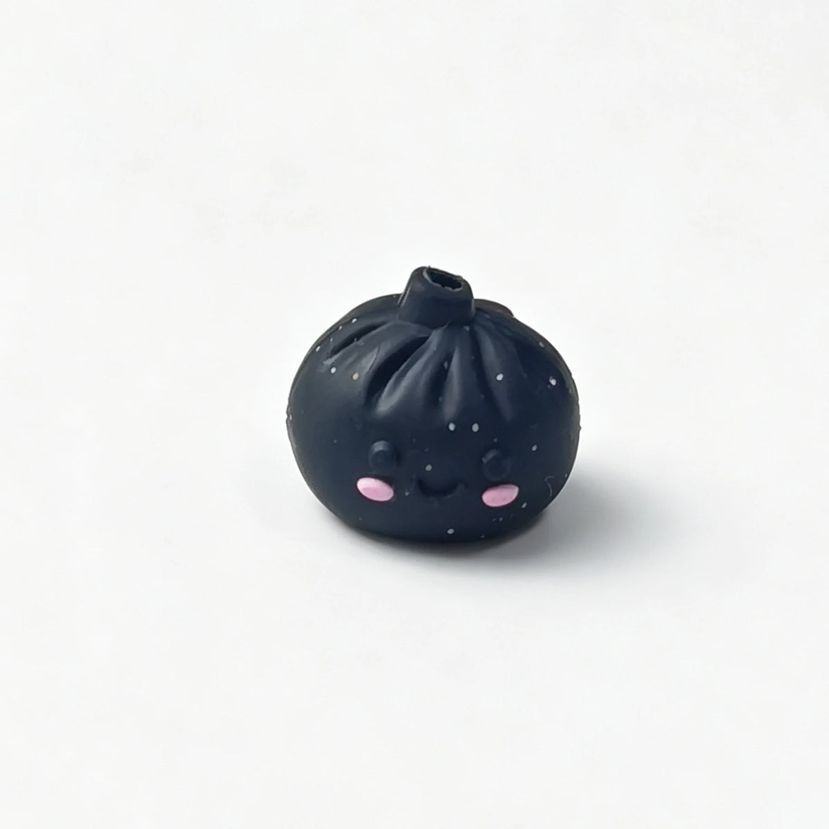 Black bao bun silicone focal bead with a smiling face