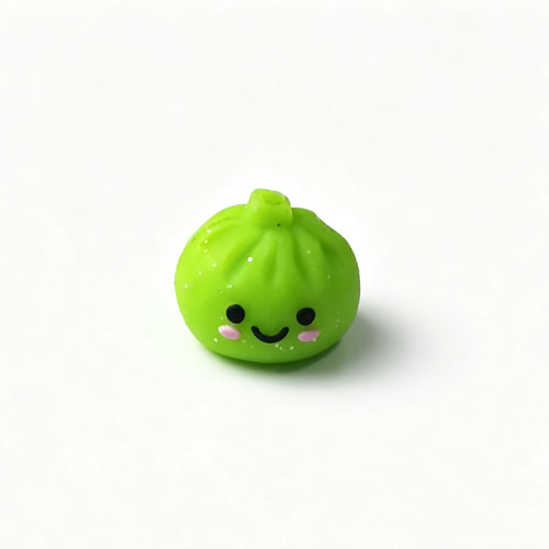 Green bao bun silicone focal bead with a smiling face