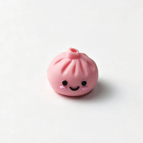 Pink bao bun silicone focal bead with a smiling face