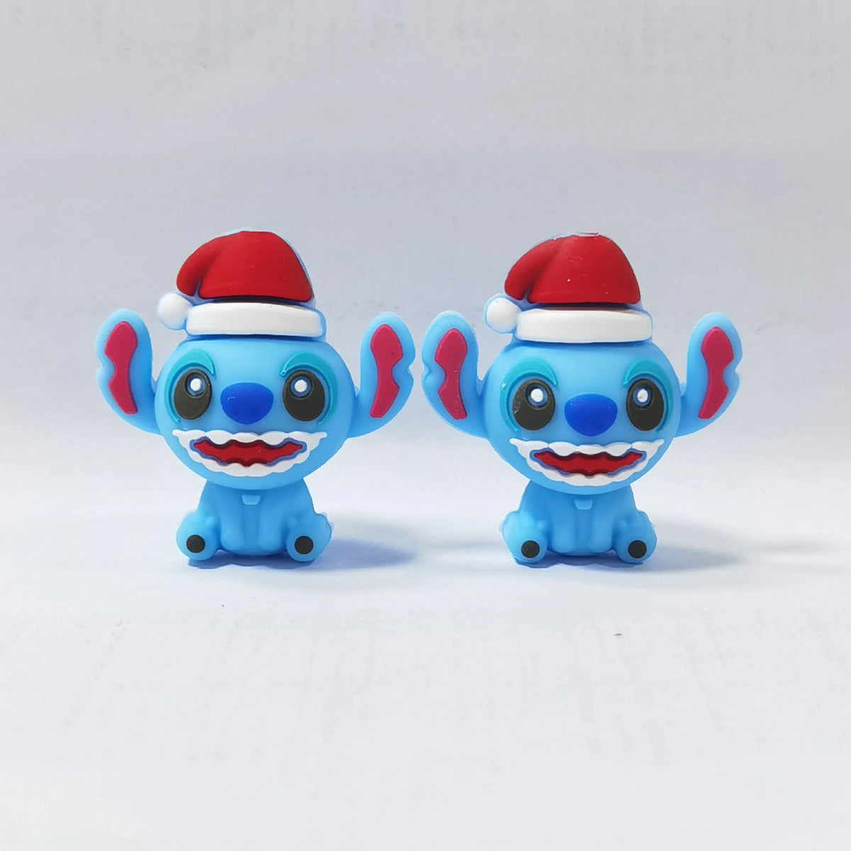 Blue Character - Santa Hat silicone focal bead design on a pale background