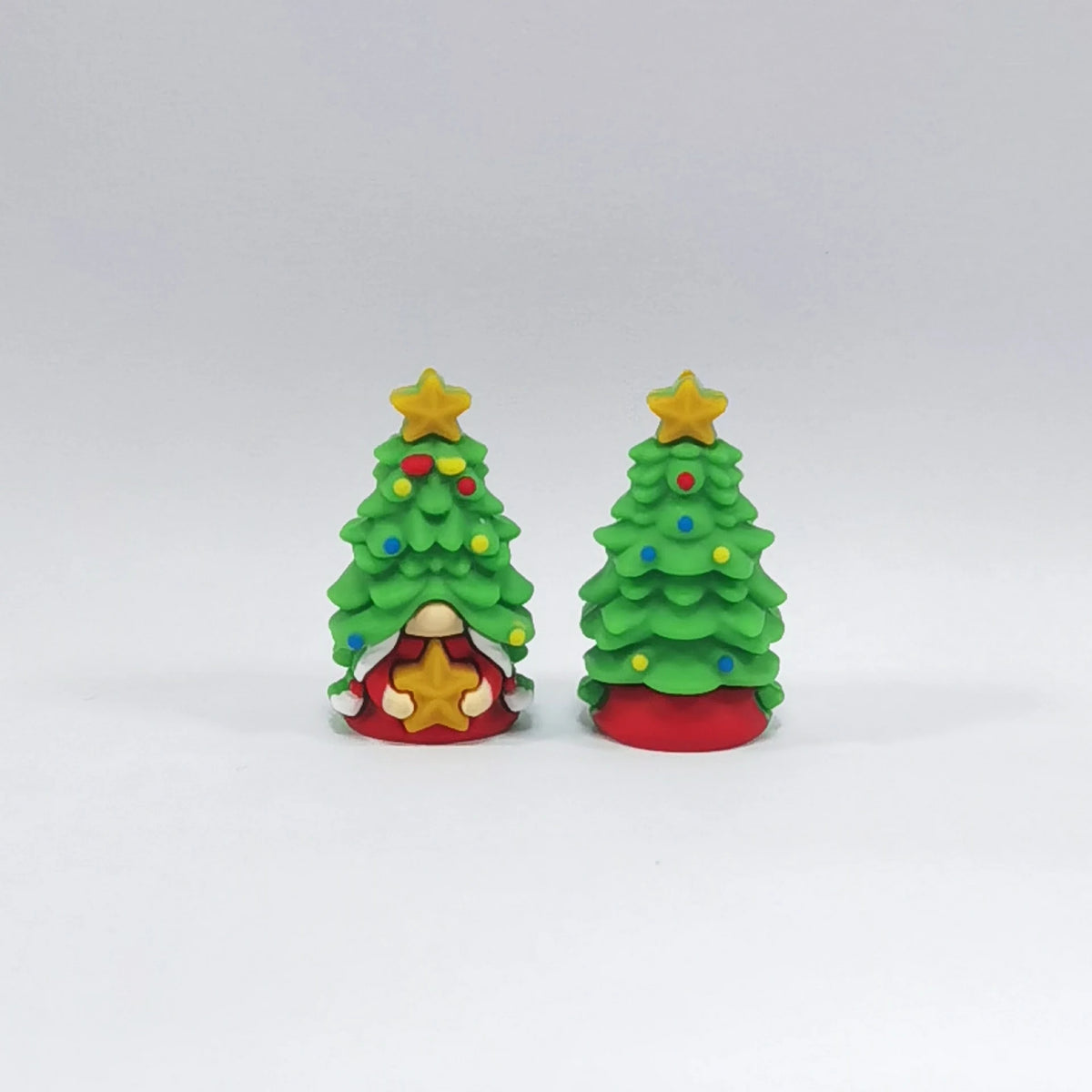 Christmas Tree - Star-Holding Gnome silicone focal bead design on a pale background