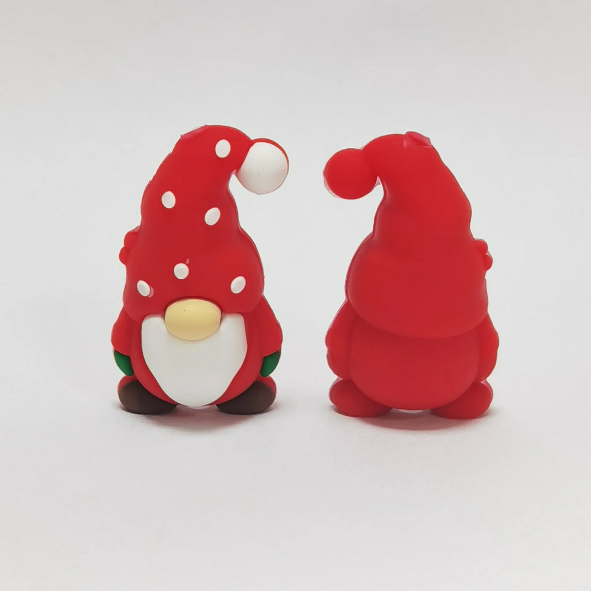 Gnome - Red Hat silicone focal bead design on a pale background