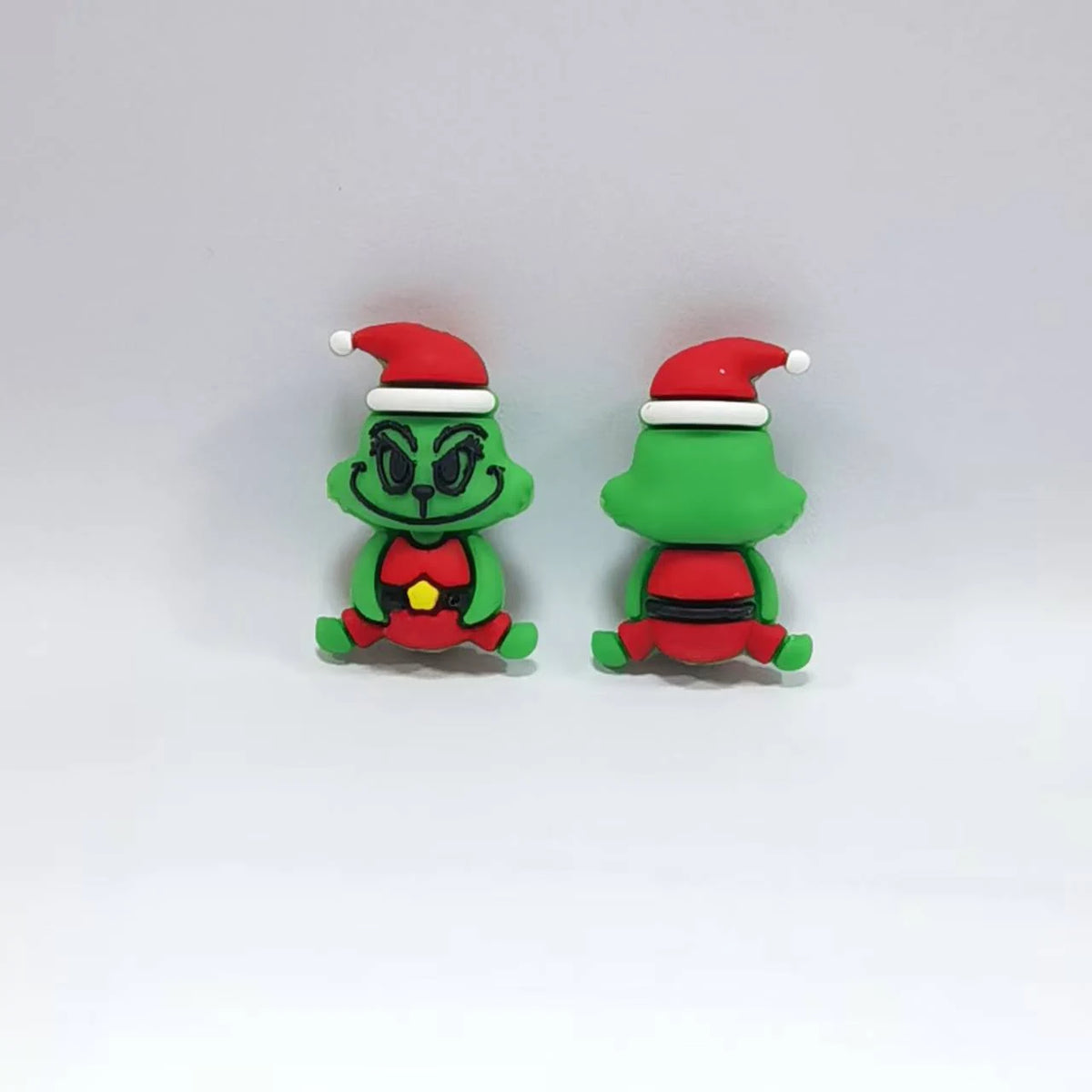 Green Character - Santa Outfit silicone focal bead design on a pale background