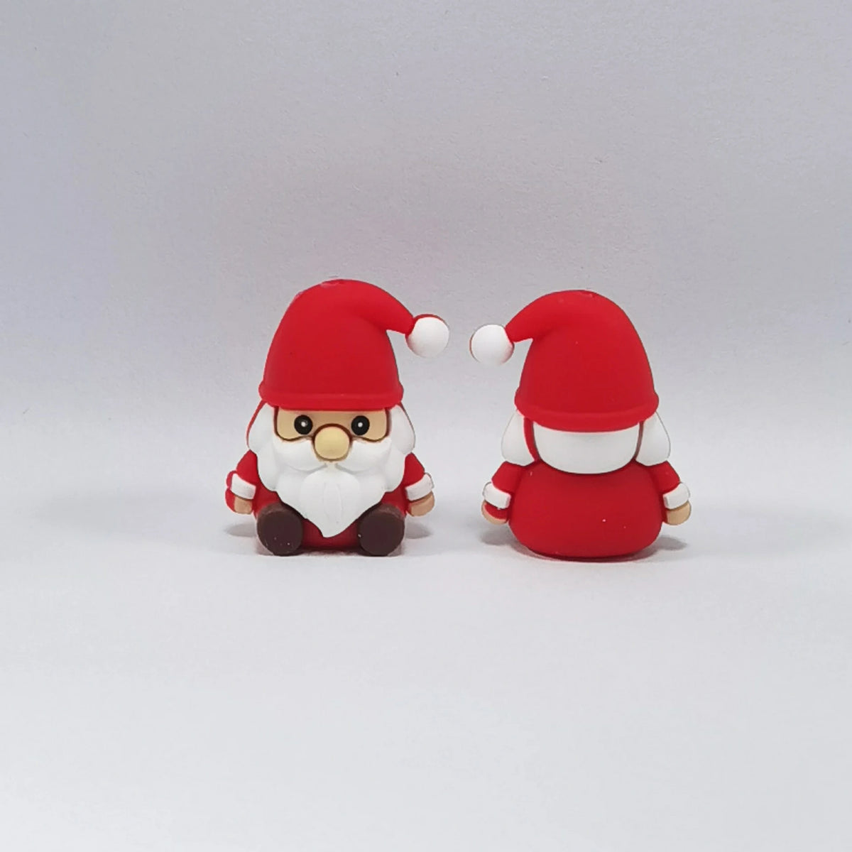 Santa - Glasses and Beard silicone focal bead design on a pale background