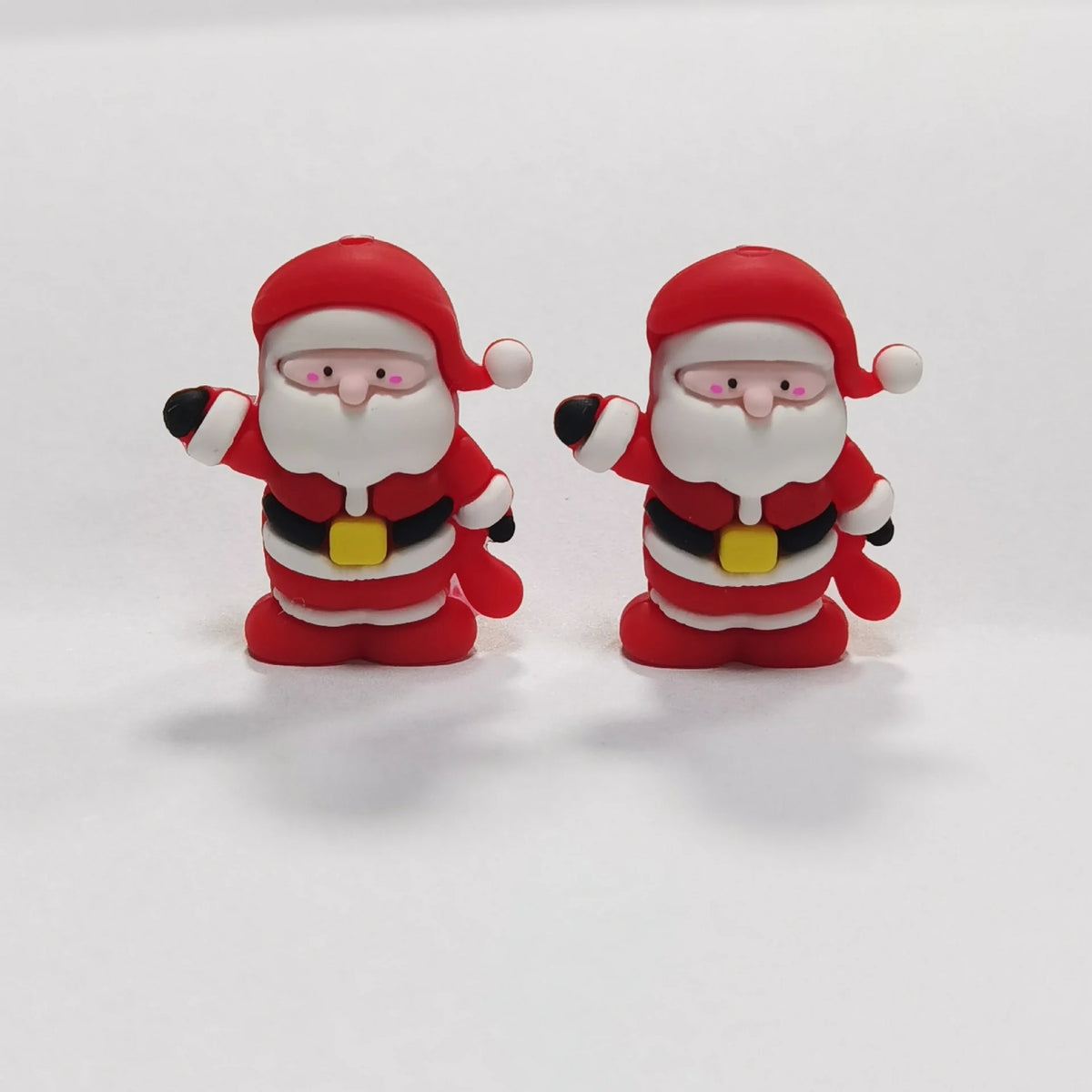 Santa - Waving silicone focal bead design on a pale background