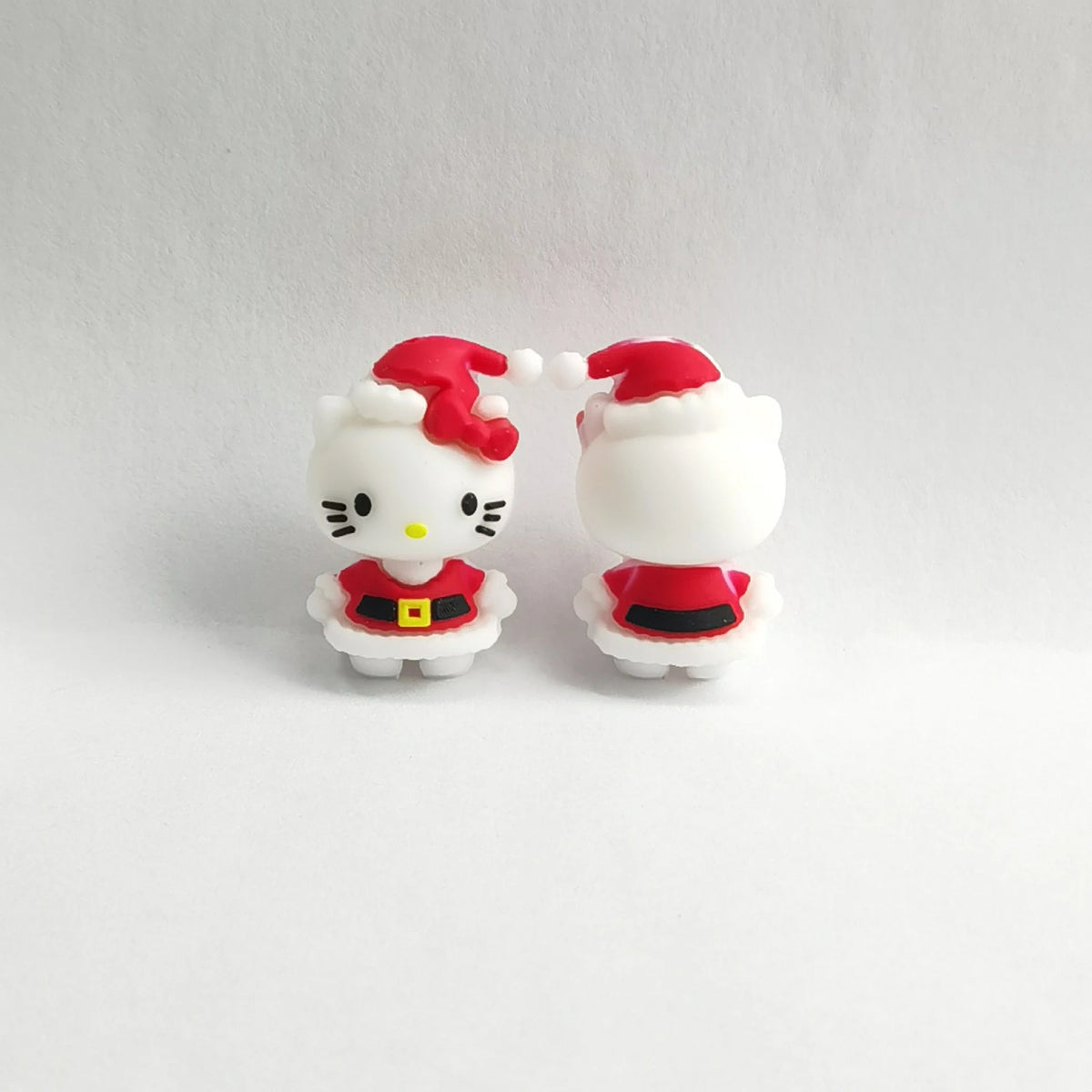 White Cat - Santa Outfit silicone focal bead design on a pale background