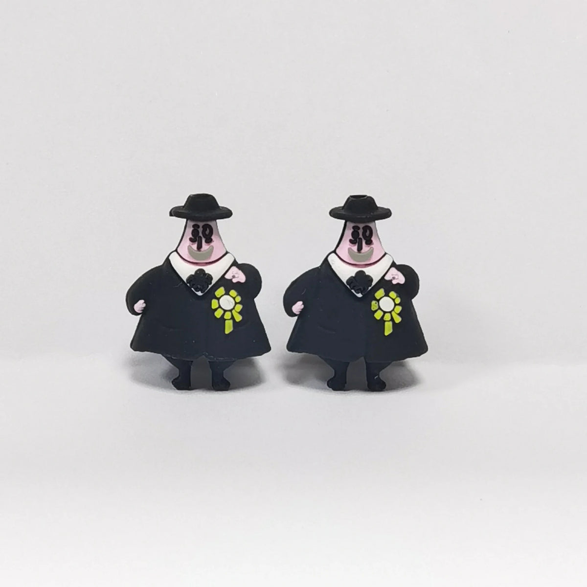 Black-Clad Figure - Flower Pin Halloween silicone focal bead design on a pale background