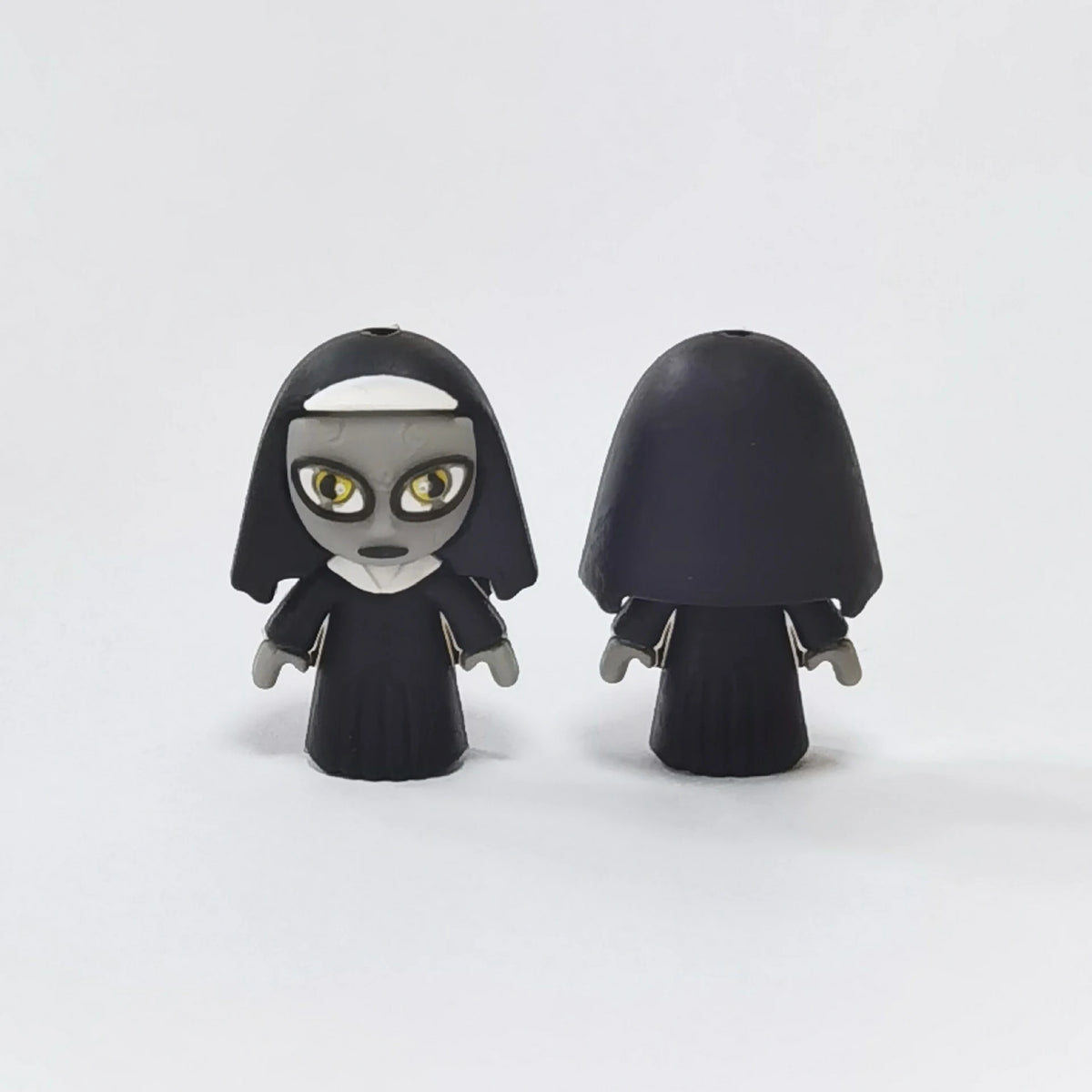 Hooded Figure - Black Robe Halloween silicone focal bead design on a pale background