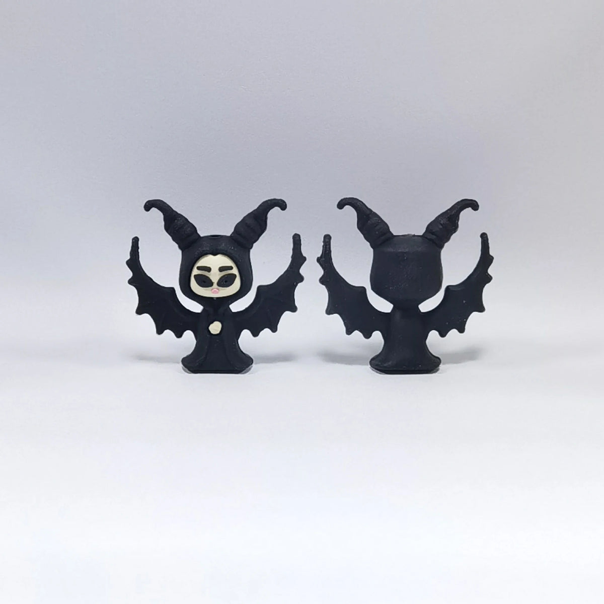 Skull Bat - Black Wings Halloween silicone focal bead design on a pale background