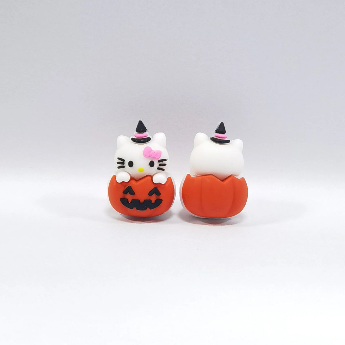 White Cat - Pumpkin Halloween silicone focal bead design on a pale background