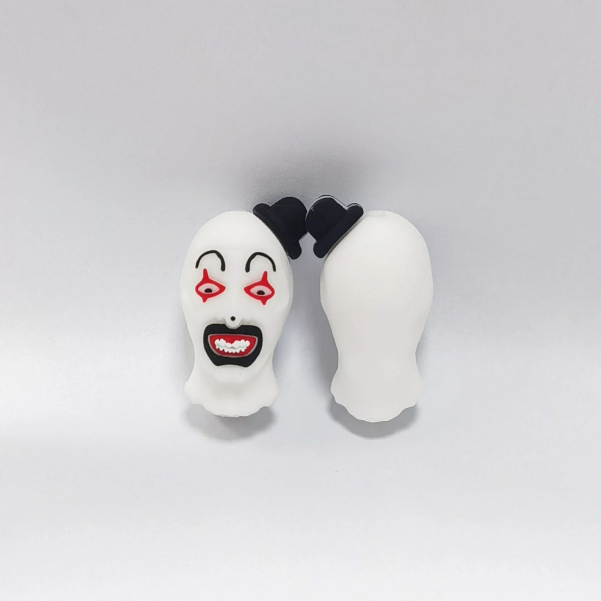White Face - Black Hair Halloween silicone focal bead design on a pale background